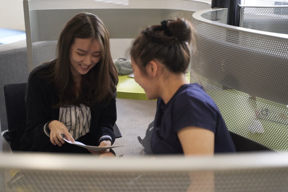 two female students talking 